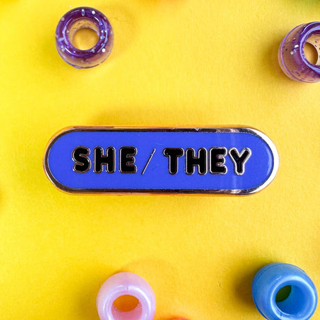 She/They Pronoun Plaque Enamel Pin