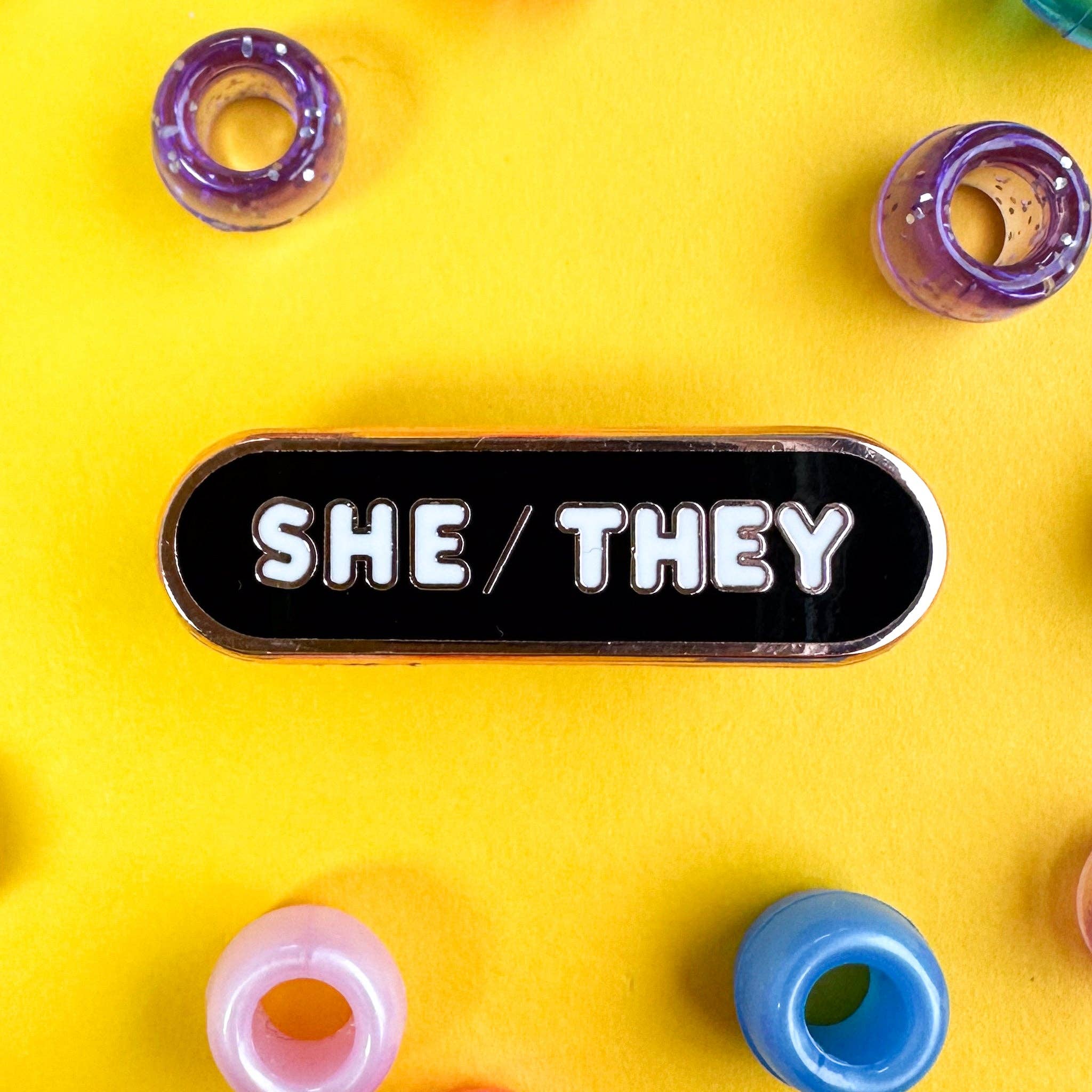 She/They Pronoun Plaque Enamel Pin